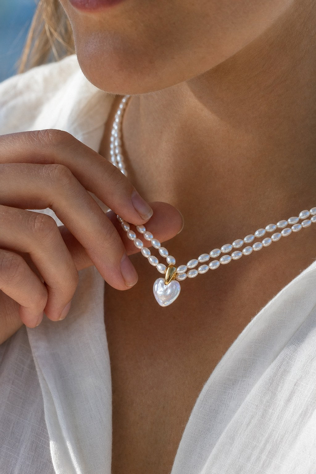 Two Tides Heart Pearl Necklace close-up detail