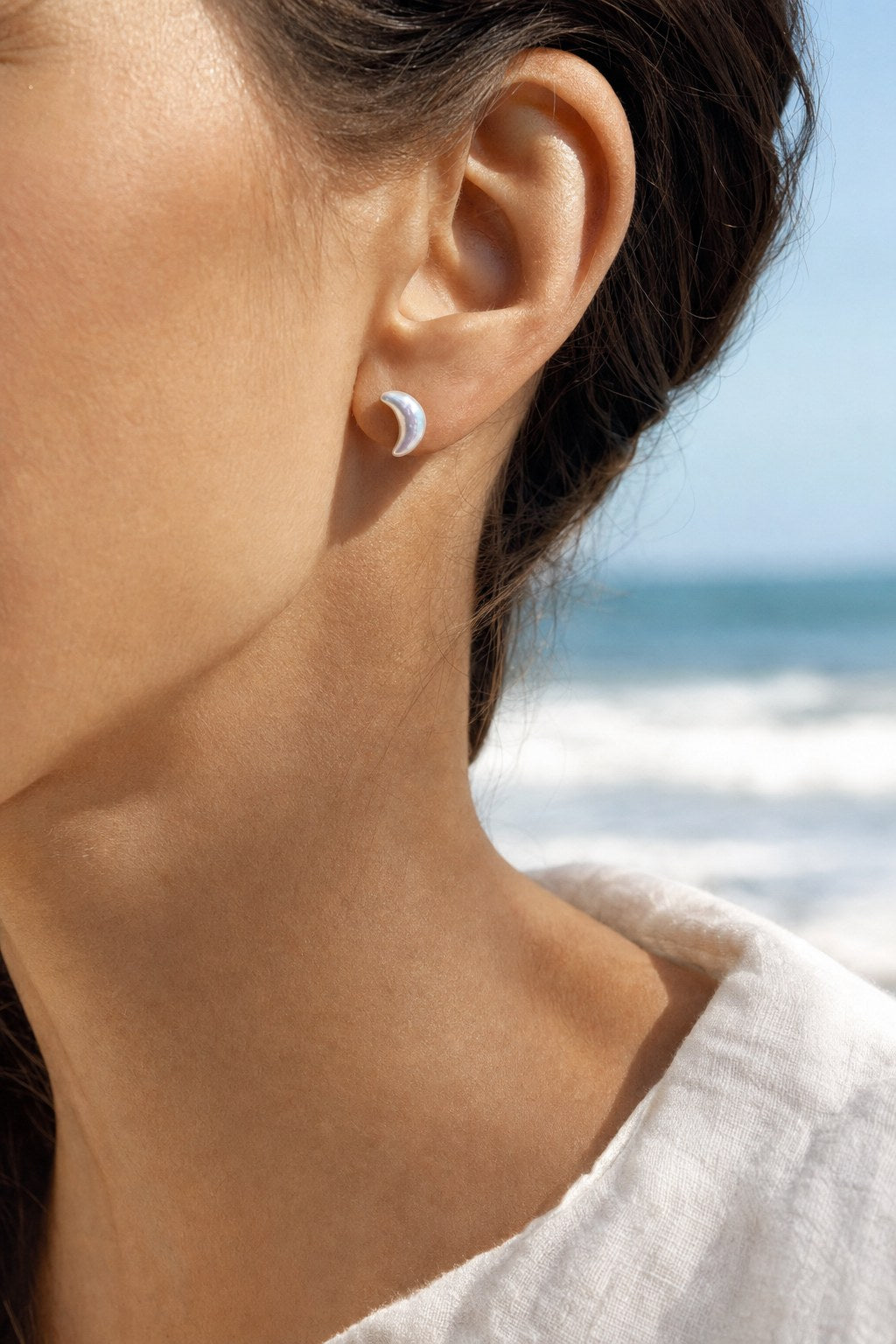 Crescent Moon Pearl Studs close-up detail