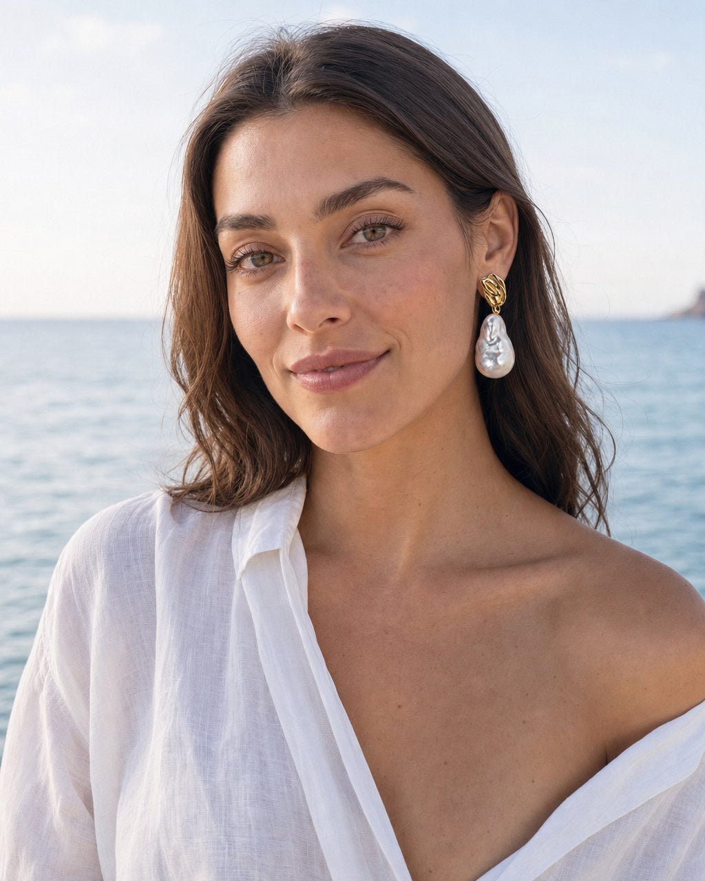 Golden Hour Baroque Drop Earrings worn by the model