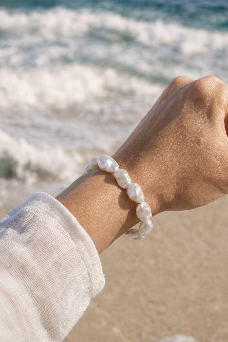 Baroque pearl bracelet worn on the wrist