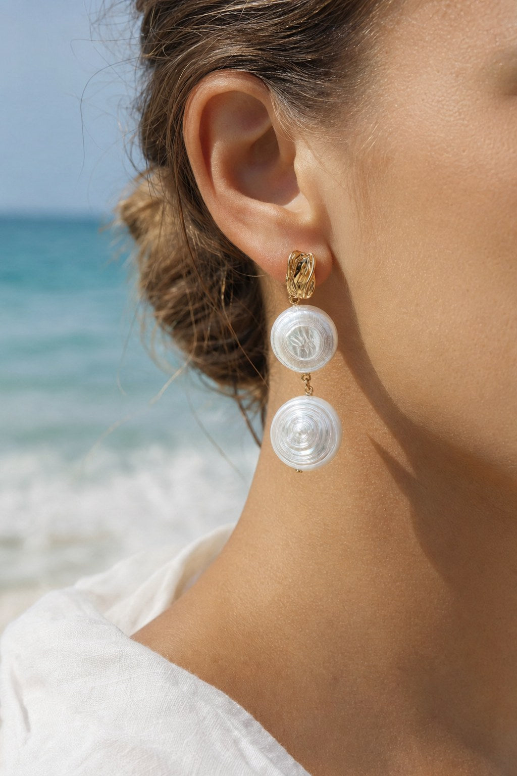 Spiral Shell Pearl Earrings close-up detail
