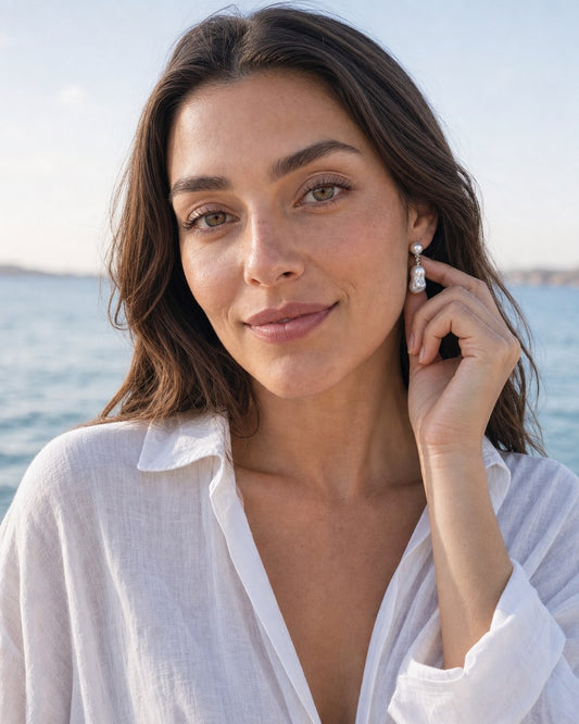 Little Wave Baroque Earrings worn by the model